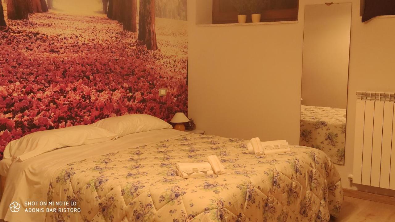 Adonis Hotel Castelvecchio Calvisio Bagian luar foto